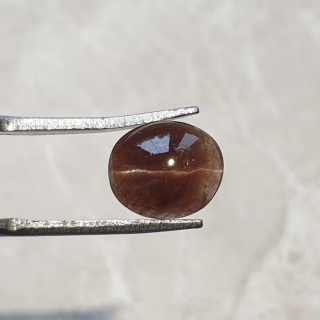 Skapolit kocie oko kaboszon 10x9 mm nr 97