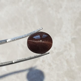 Skapolit kocie oko kaboszon 11x10 mm nr 134