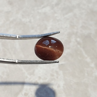 Skapolit kocie oko kaboszon 11x10 mm nr 144