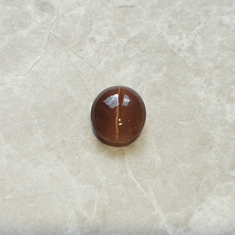 Skapolit kocie oko kaboszon 11x10 mm nr 158