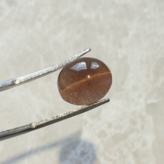 Skapolit kocie oko kaboszon 11x10 mm nr 158