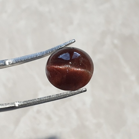 Skapolit kocie oko kaboszon 11x11 mm nr 140