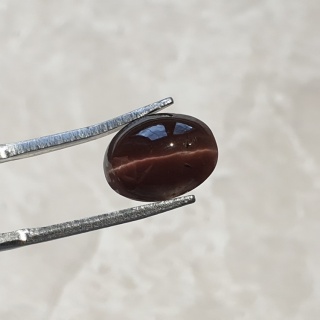 Skapolit kocie oko kaboszon 11x8 mm nr 135