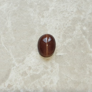 Skapolit kocie oko kaboszon 11x8 mm nr 155