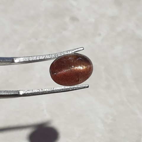 Scapolite cat's eye cabochon 11x8 mm no 185