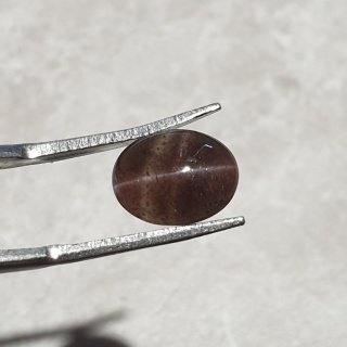 Skapolit kocie oko kaboszon 11x8 mm nr 208