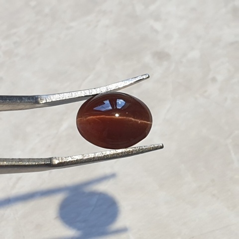 Skapolit kocie oko kaboszon 11x8 mm nr 58