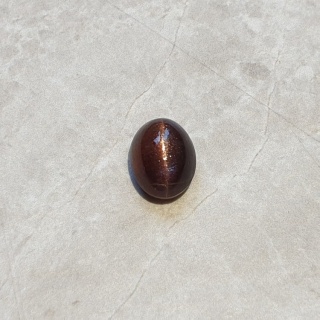 Skapolit kocie oko kaboszon 11x8 mm nr 67