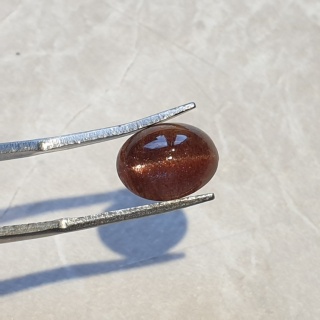 Skapolit kocie oko kaboszon 11x8 mm nr 67