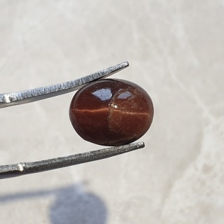 Skapolit kocie oko kaboszon 11x9 mm nr 104