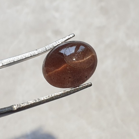 Scapolite cat's eye cabochon 11x9 mm no 106