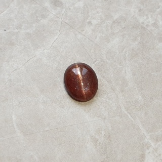 Skapolit kocie oko kaboszon 11x9 mm nr 127