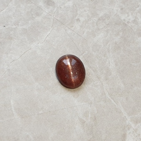 Skapolit kocie oko kaboszon 11x9 mm nr 127