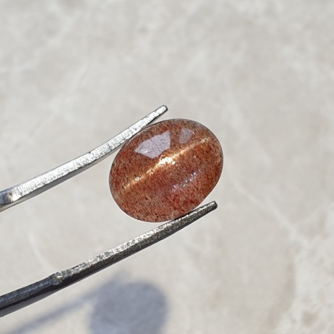 Skapolit kocie oko kaboszon 11x9 mm nr 127