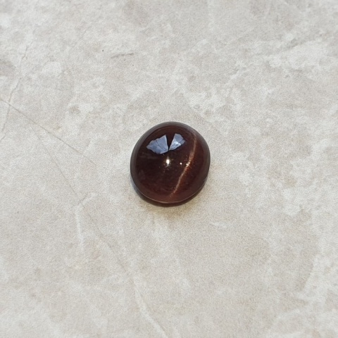 Scapolite cat's eye cabochon 11x9 mm no 152