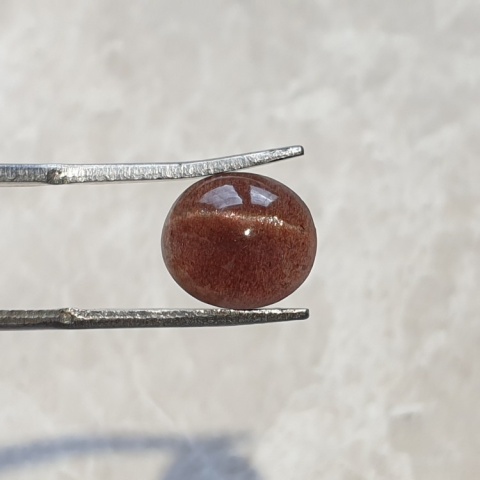 Scapolite cat's eye cabochon 11x9 mm no 152