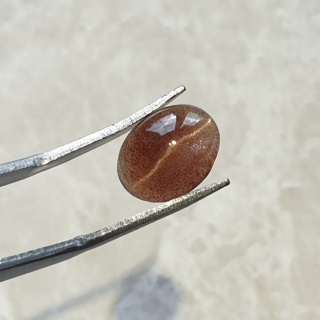 Skapolit kocie oko kaboszon 11x9 mm nr 157