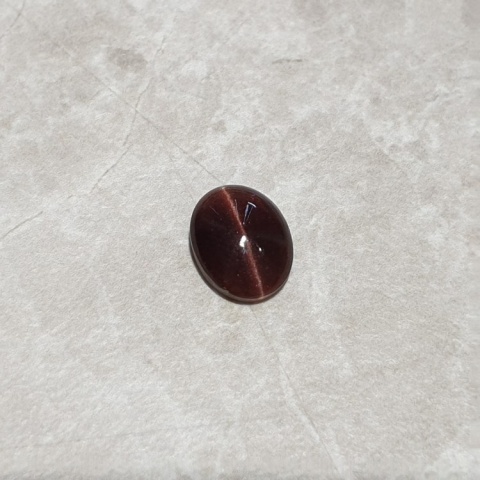 Skapolit kocie oko kaboszon 11x9 mm nr 173