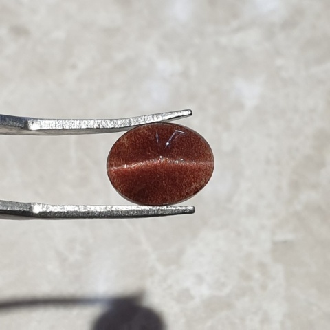 Skapolit kocie oko kaboszon 11x9 mm nr 173