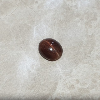 Skapolit kocie oko kaboszon 11x9 mm nr 176