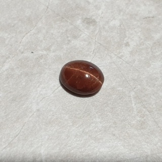 Skapolit kocie oko kaboszon 11x9 mm nr 184