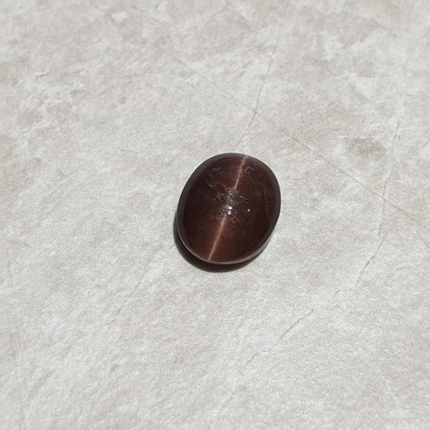 Skapolit kocie oko kaboszon 11x9 mm nr 214