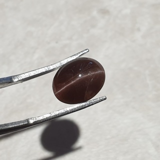 Skapolit kocie oko kaboszon 11x9 mm nr 215