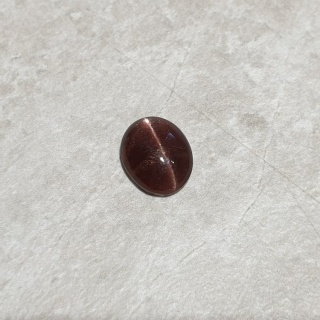 Skapolit kocie oko kaboszon 11x9 mm nr 236