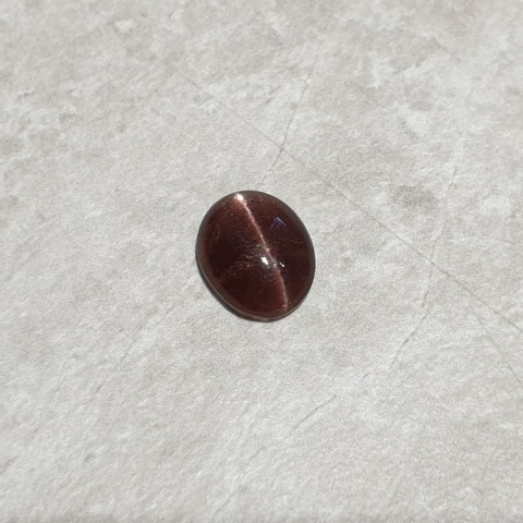 Skapolit kocie oko kaboszon 11x9 mm nr 236