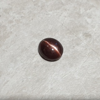 Skapolit kocie oko kaboszon 11x9 mm nr 257