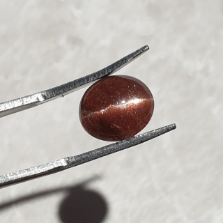 Skapolit kocie oko kaboszon 11x9 mm nr 257