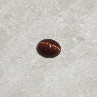 Skapolit kocie oko kaboszon 11x9 mm nr 264