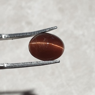 Skapolit kocie oko kaboszon 11x9 mm nr 264