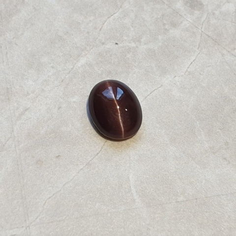 Skapolit kocie oko kaboszon 11x9 mm nr 60