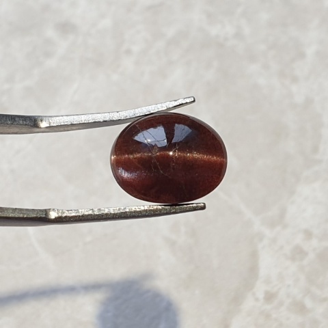 Skapolit kocie oko kaboszon 12x10 mm nr 130