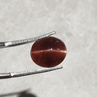 Skapolit kocie oko kaboszon 12x10 mm nr 192