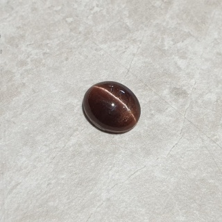 Skapolit kocie oko kaboszon 12x10 mm nr 204