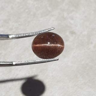 Skapolit kocie oko kaboszon 12x10 mm nr 204