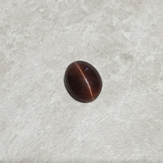 Skapolit kocie oko kaboszon 12x10 mm nr 217