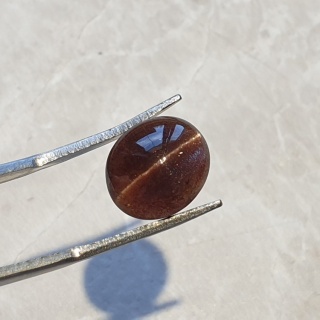 Skapolit kocie oko kaboszon 12x10 mm nr 71