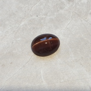 Skapolit kocie oko kaboszon 12x10 mm nr 77