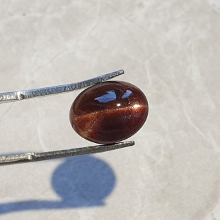 Skapolit kocie oko kaboszon 12x10 mm nr 81