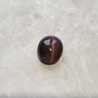 Skapolit kocie oko kaboszon 12x10 mm nr 98