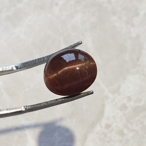 Skapolit kocie oko kaboszon 12x10 mm nr 98