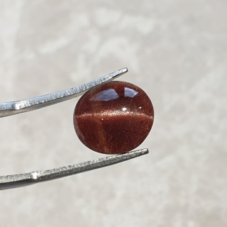 Skapolit kocie oko kaboszon 12x11 mm nr 146