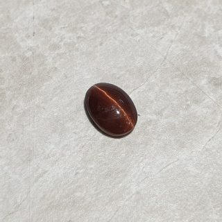 Skapolit kocie oko kaboszon 12x8 mm nr 249