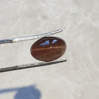 Skapolit kocie oko kaboszon 12x8 mm nr 52