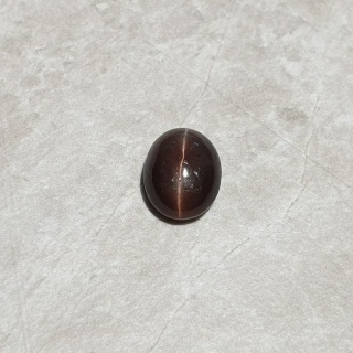 Skapolit kocie oko kaboszon 12x9 mm nr 209