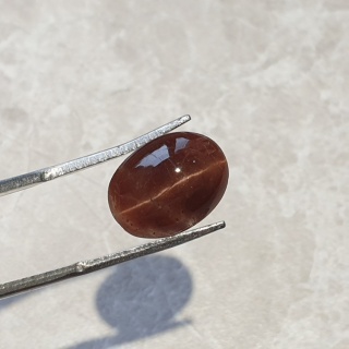 Skapolit kocie oko kaboszon 14x10 mm nr 83