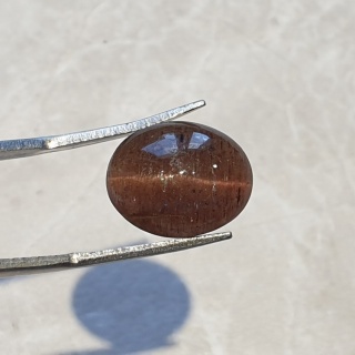 Skapolit kocie oko kaboszon 15x12 mm nr 55